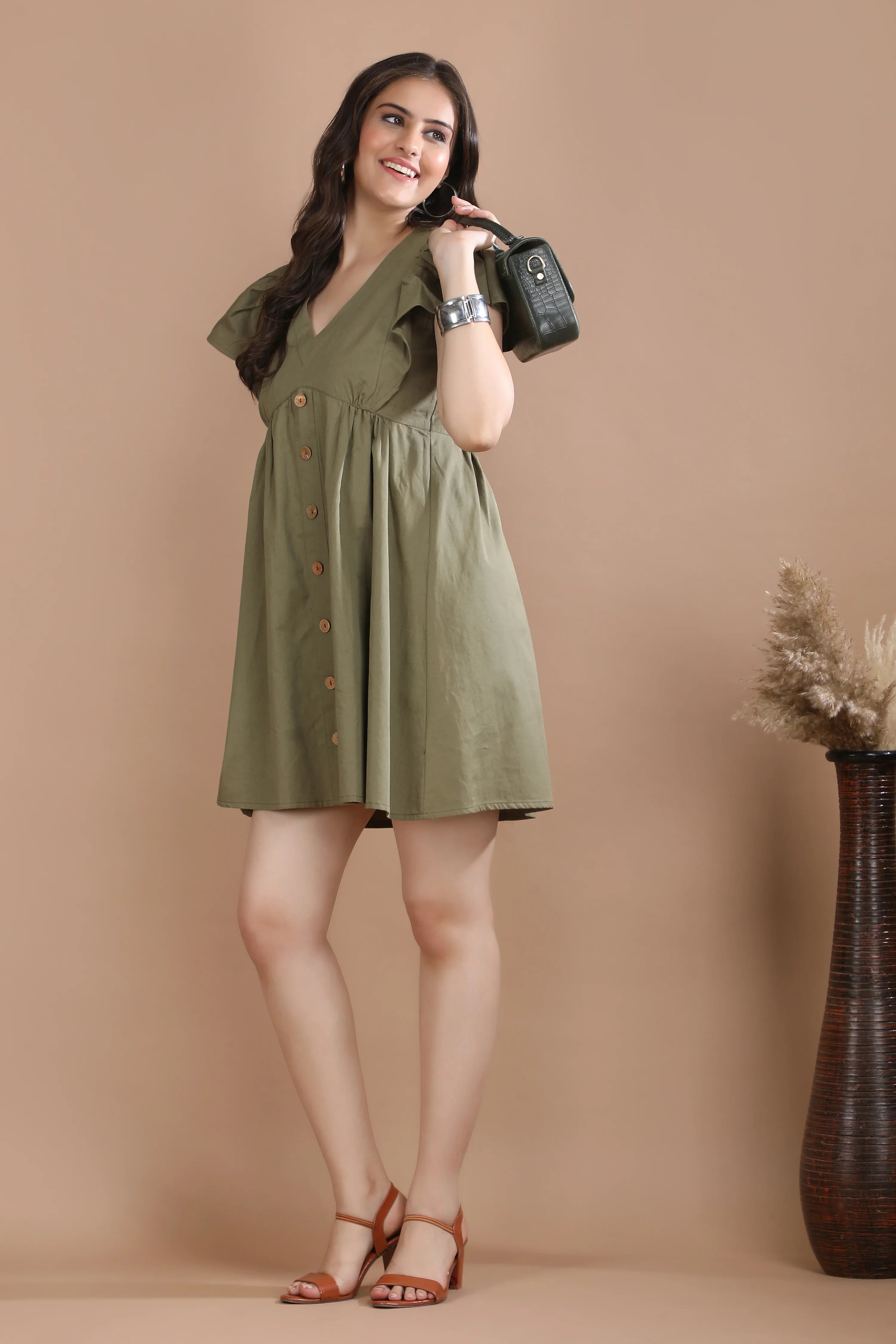 The Olive Edit olive green dress – styled look
