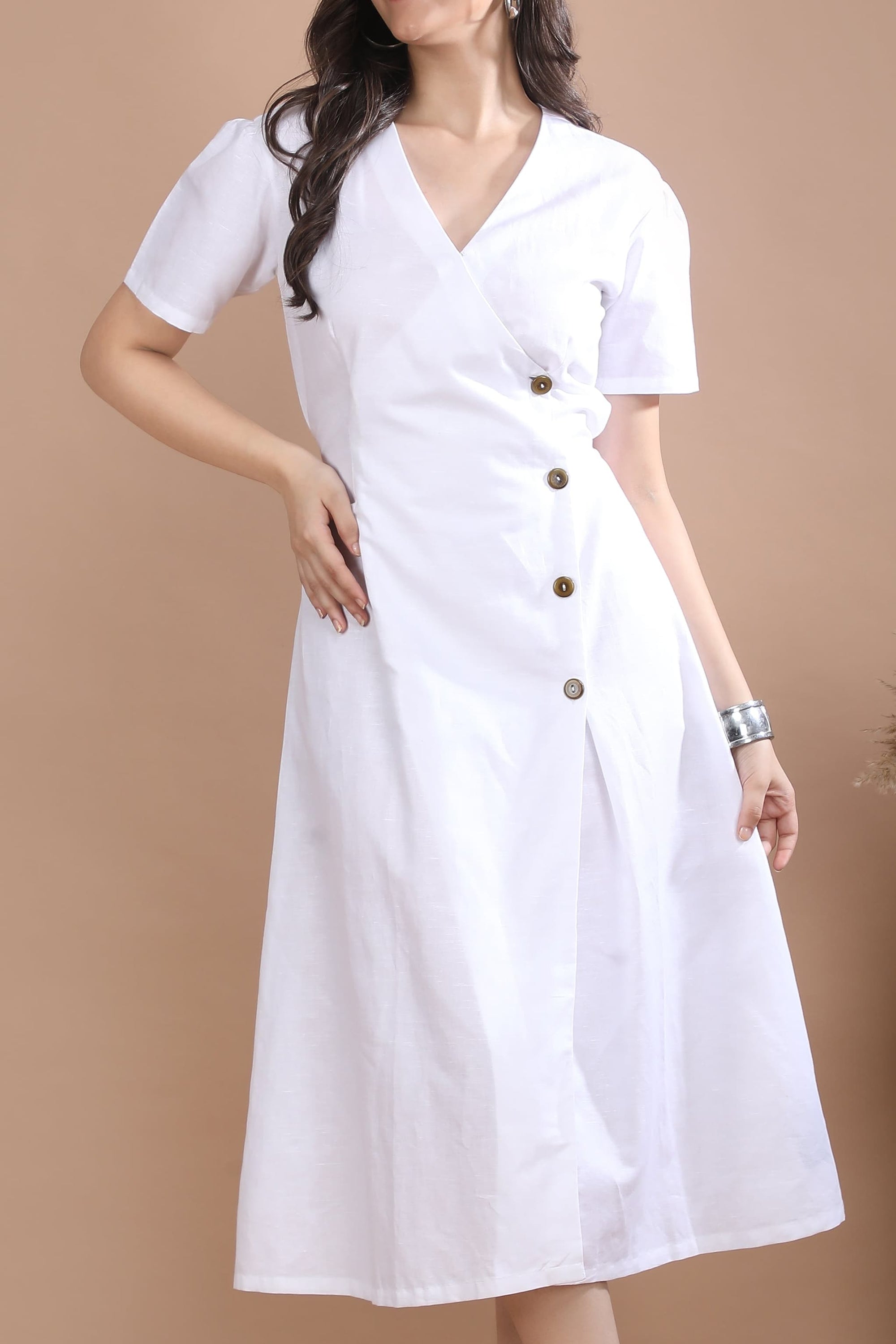 Close-up of the cotton-linen fabric used in the Ivory Wrap Midi Dress by Guilt & Class, showing its natural texture and lightweight weave.