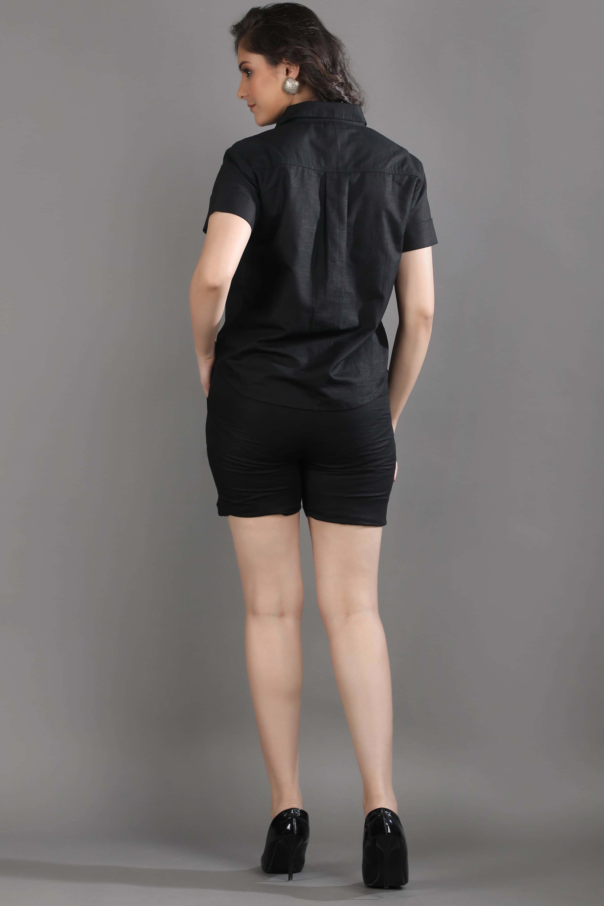 Back view of the Midnight Theory co-ord set by Guilt & Class, highlighting the structured shirt and tailored fit of the shorts.
