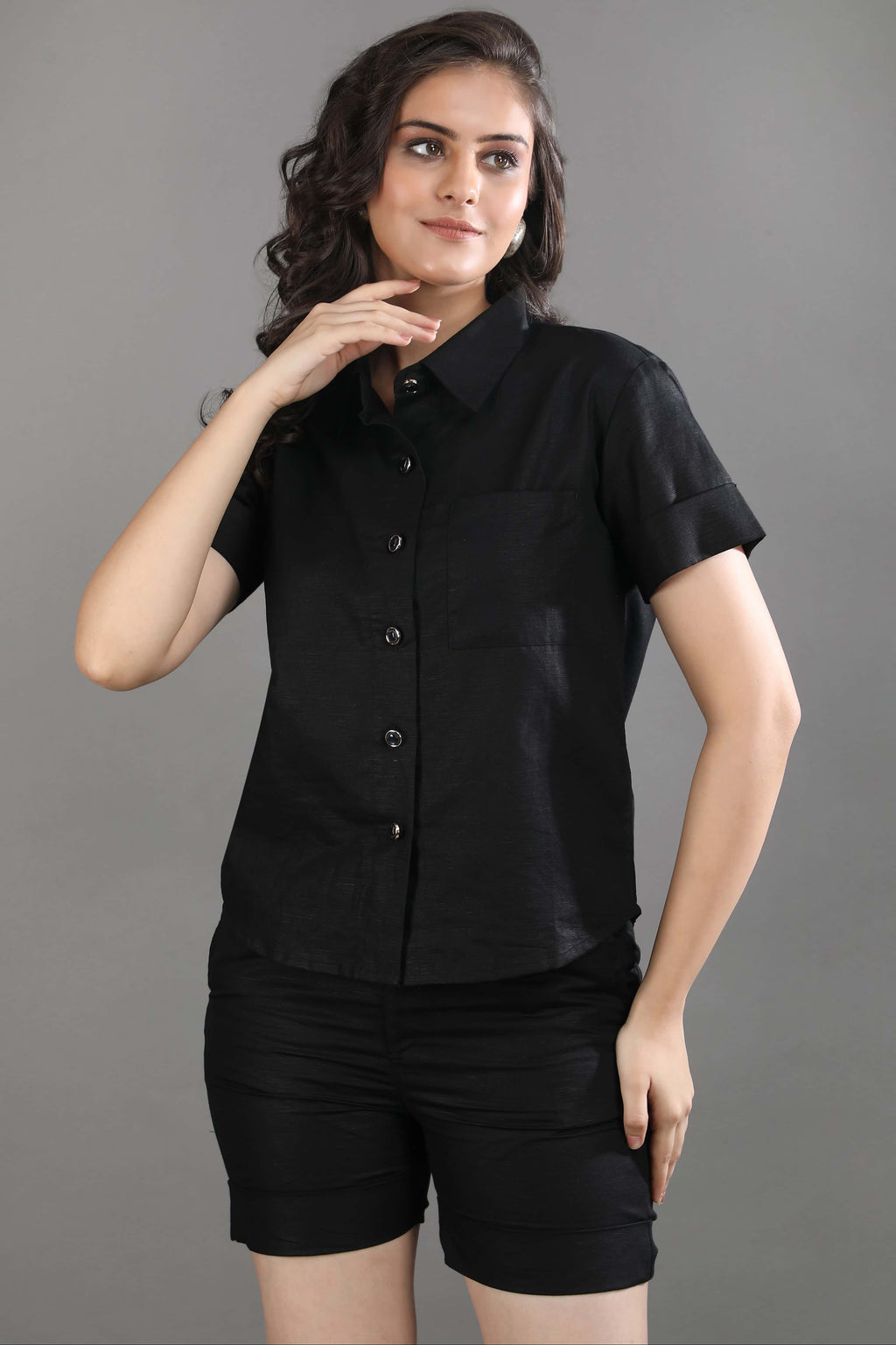 Close-up view of the Midnight Theory co-ord set by Guilt & Class, focusing on the structured shirt, sharp collar, and minimal detailing.