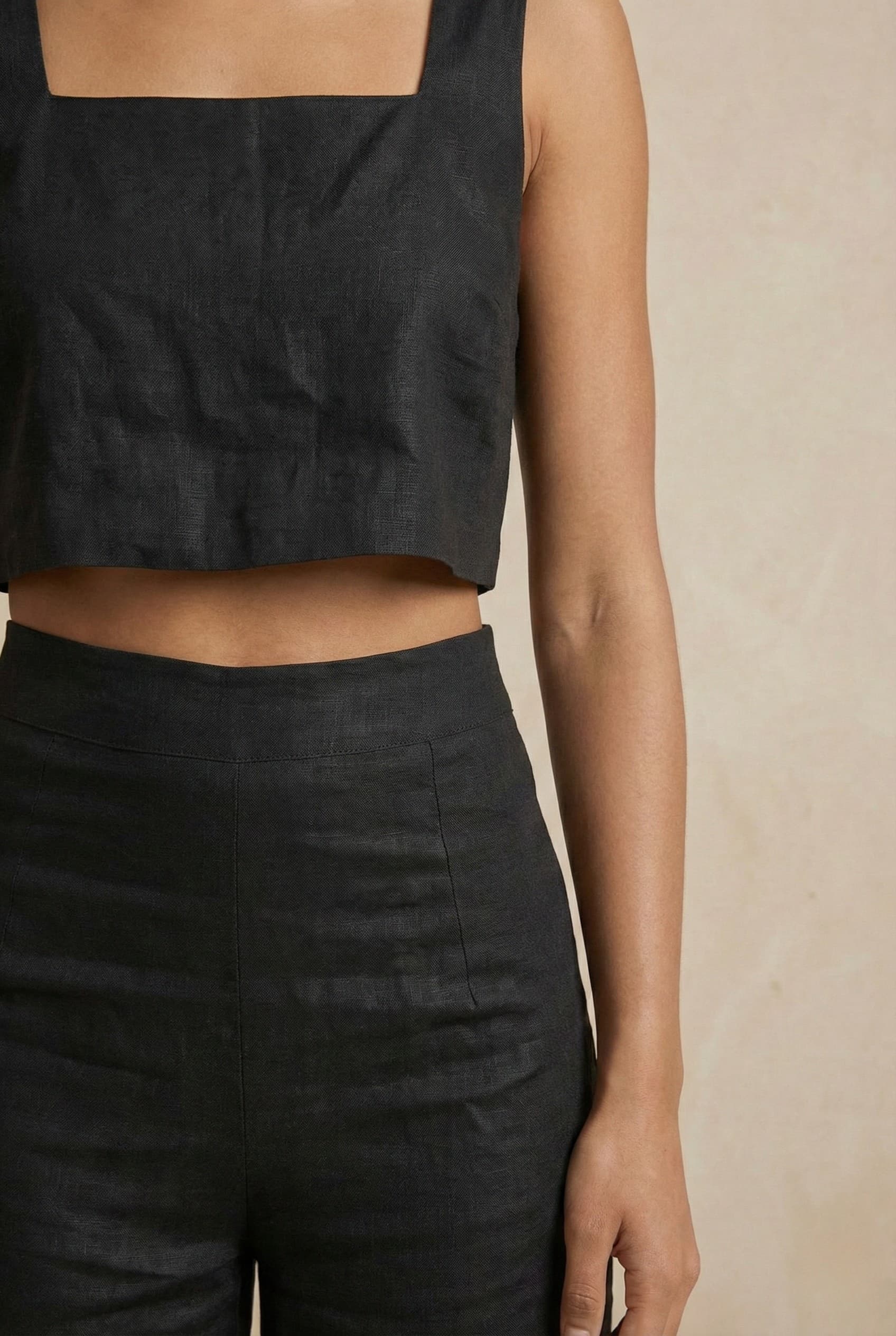 Close-up of the Noir linen co-ord top by Guilt & Class, highlighting the square neckline and cotton-linen texture.
