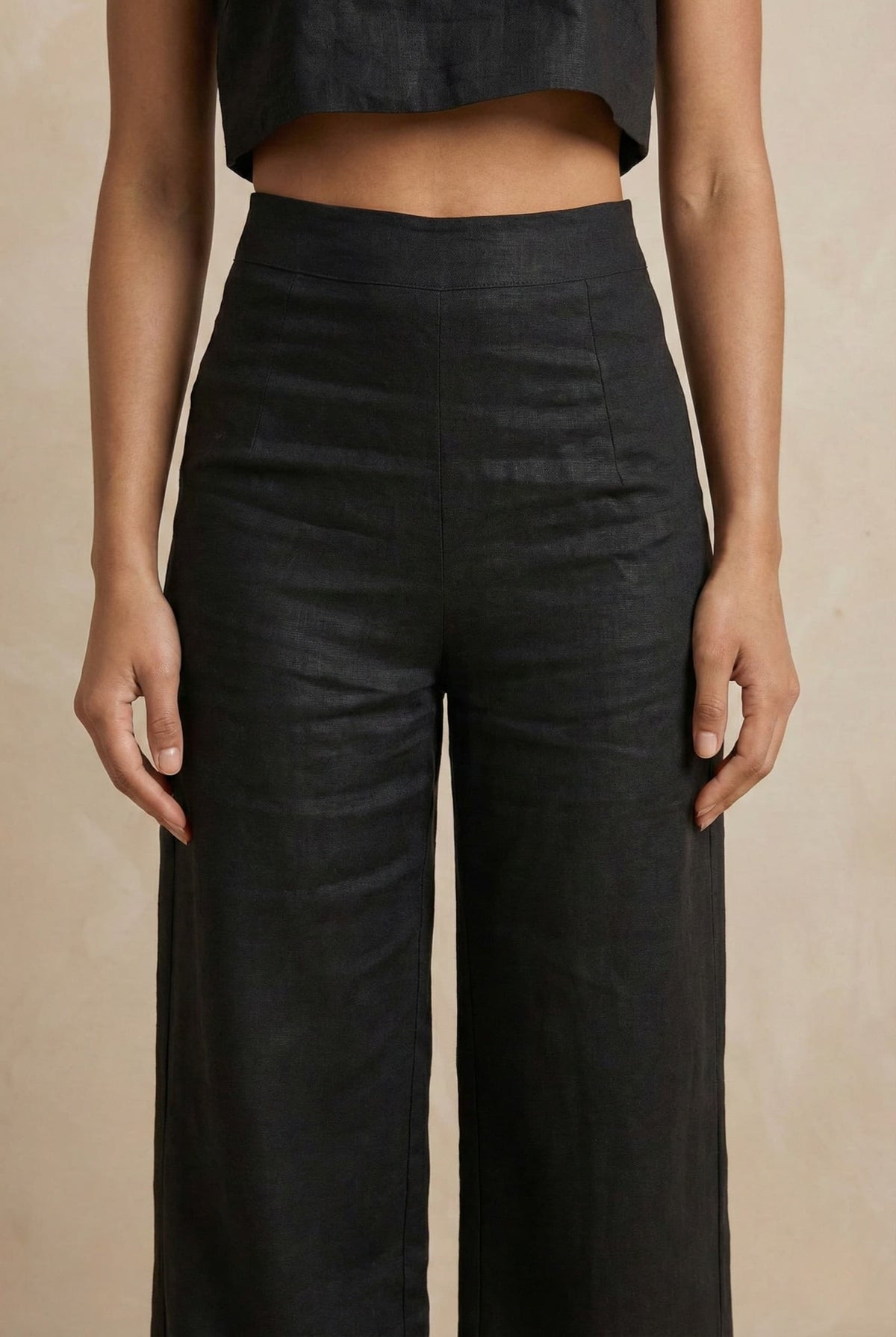 Close-up of the Noir linen co-ord trouser by Guilt & Class, highlighting the waistline and cotton-linen texture.