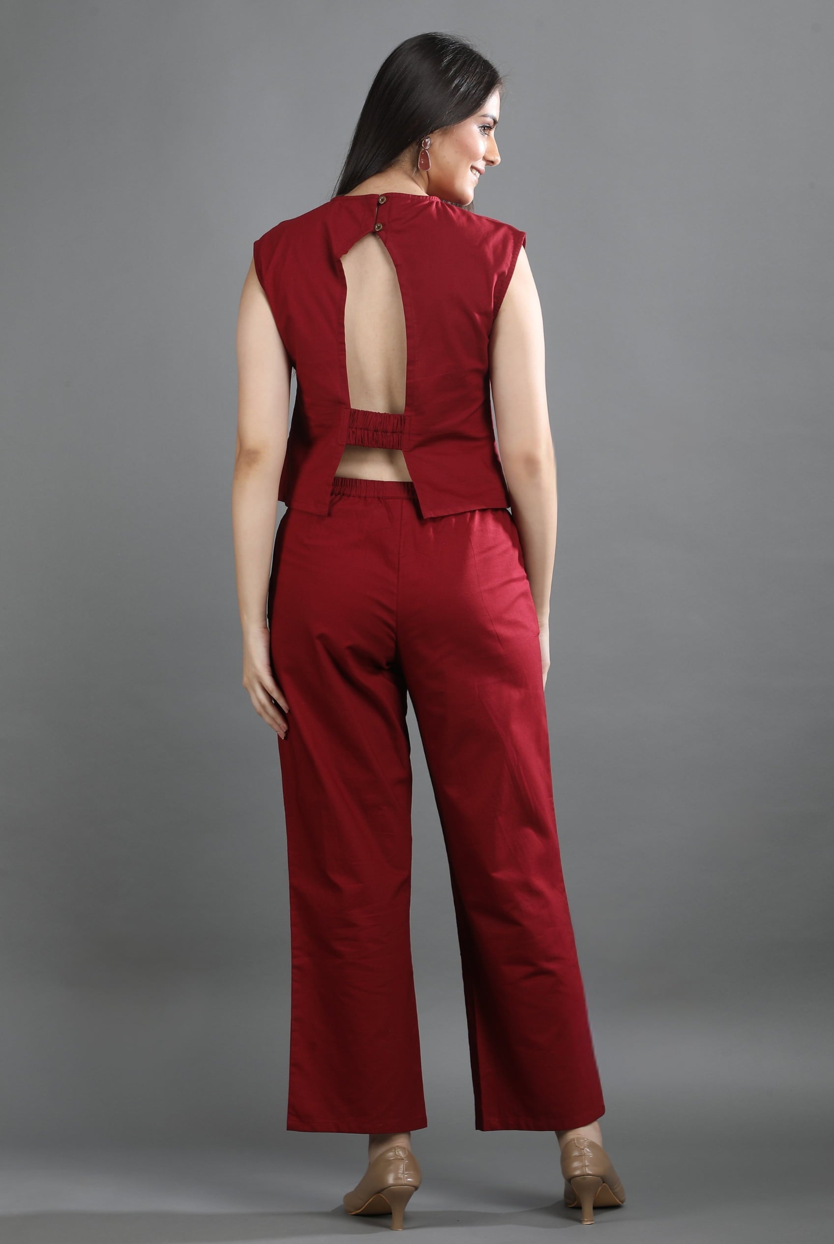 Back view of the Oxford Ease co-ord set by Guilt & Class, featuring a sleeveless top with button closure and an elasticated back.