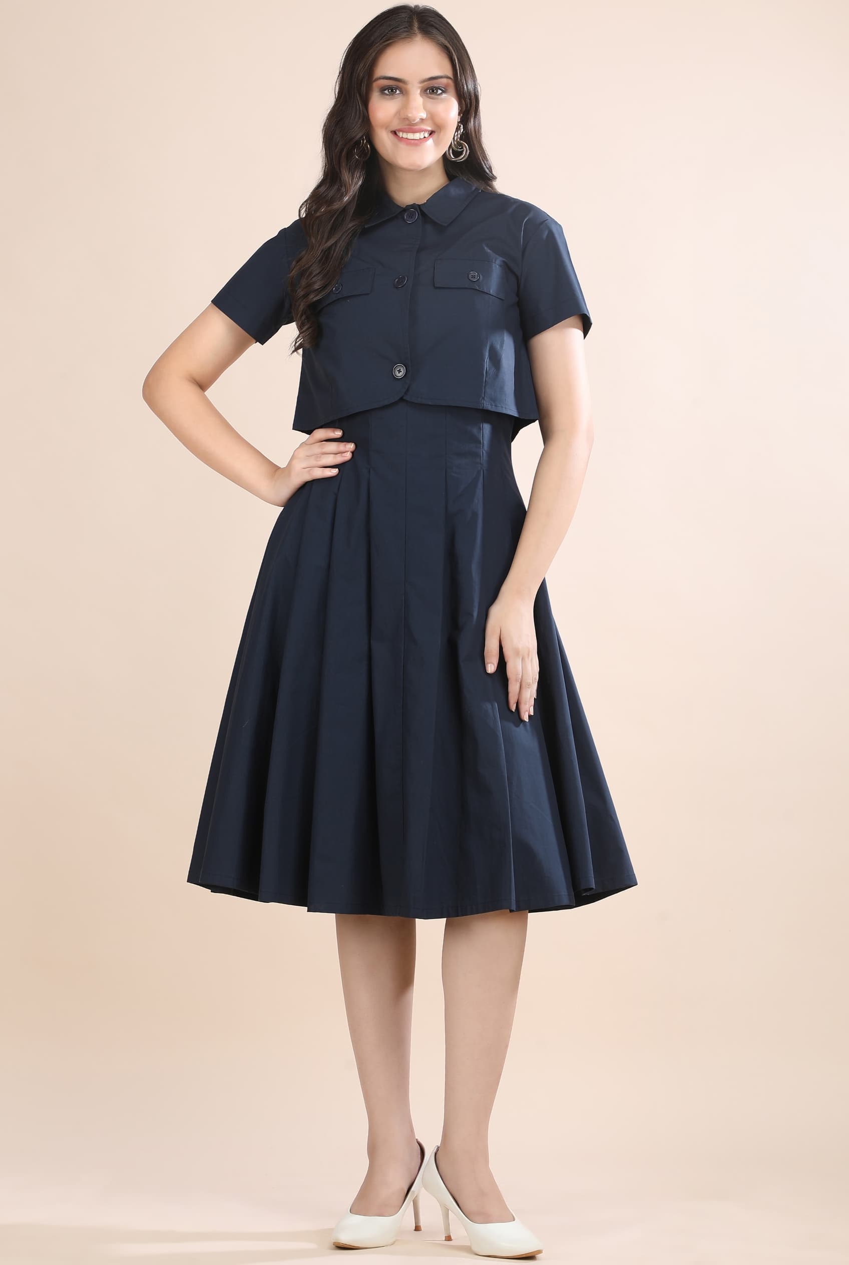 Front view of the overlay jacket in the Shape in Blue set by Guilt & Class, highlighting the structured cotton and collar detail.