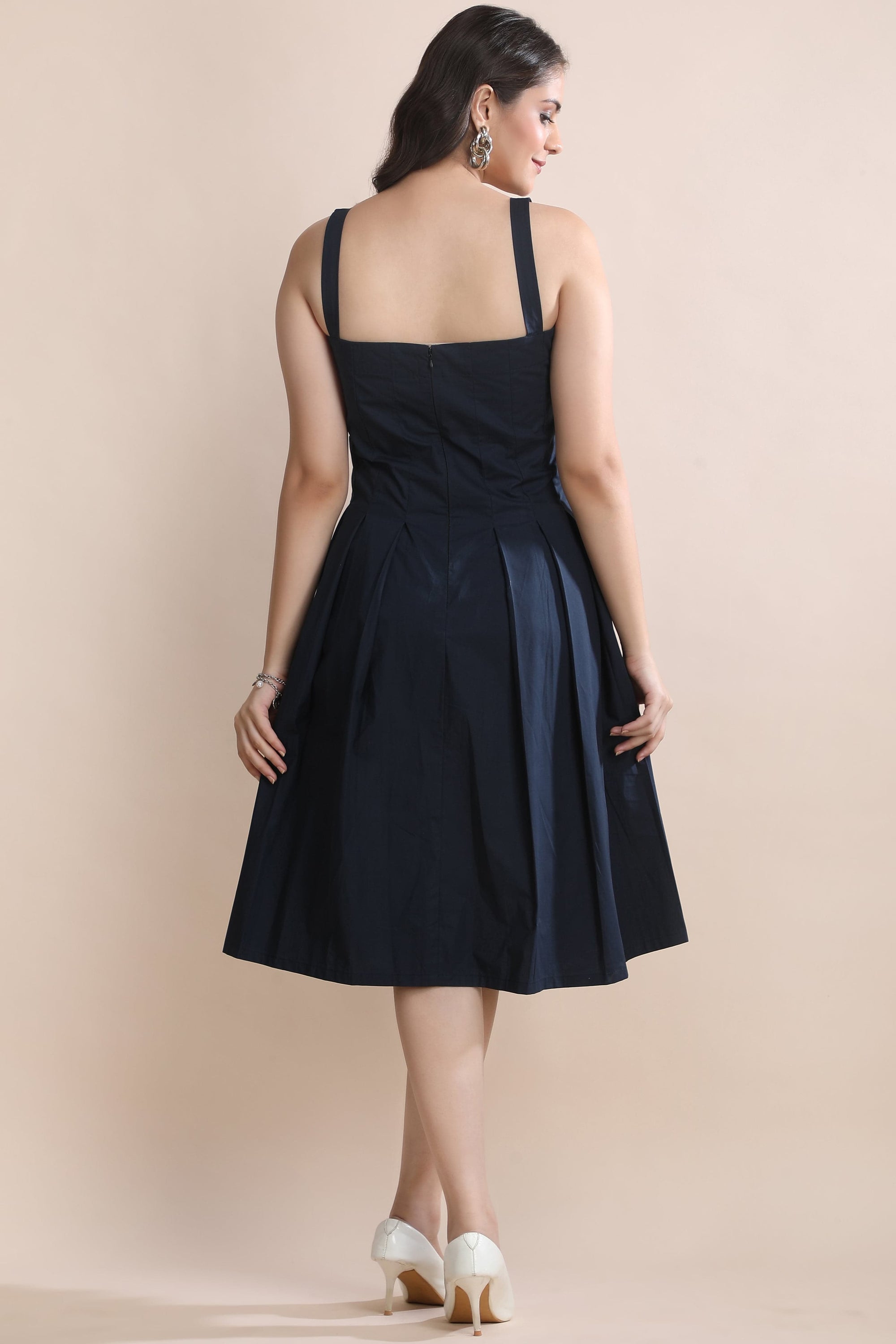 Back view of the Shape in Blue cotton dress set by Guilt & Class, showing the clean structure and tailored finish.